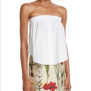 Oscar De La Renta shirttail hem. Never worn.